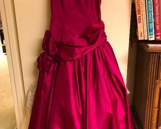 and a dress cut down to there