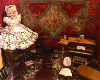 Becky floating above her furniture