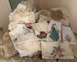 plethora of hand-stitched and embroidered handkerchiefs