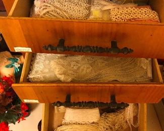drawers full of antique lace