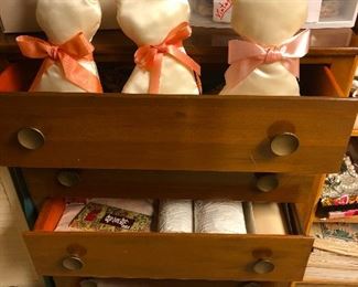 Three pink-bowed ghost cats