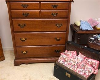 highboy with brass nipples, and travel chest full of giant marshmallows