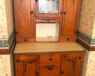 Antique Oak Hoosier Cabinet with sliding metal work surface.