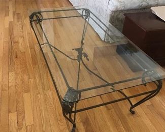 Glass and metal rectangle coffee table.