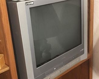 TV with VHS & DVD player built in.  Works.  Would be great for a child's room for Disney movies