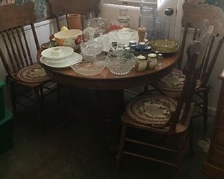 antique oak table with four chairs