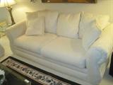 Matching white upholstered sofa w/6 pillows