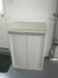 Sterlite storage cabinet with glass on top