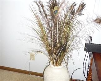 Peacock feathers in vase