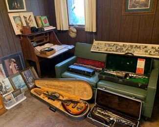 desk..prints..musical instruments..yard long photo..vintage cards..vintage couch