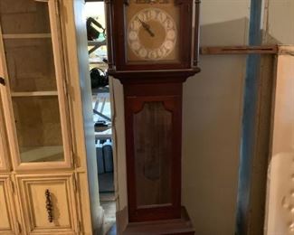 grandfather  clock...needs some repair