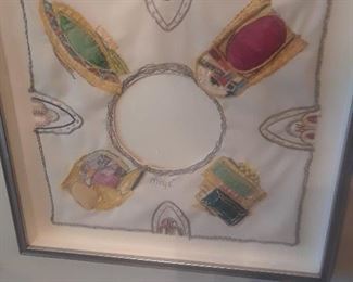 Rendering of Miye's various jewelry pieces form a pleasing composition that is framed as a work of art.