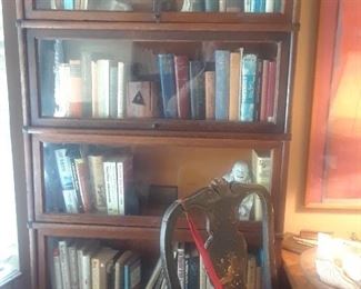 One of a pair of barrister bookcases. Each is five sections. Globe-Wernicke Co. labels in most sections.