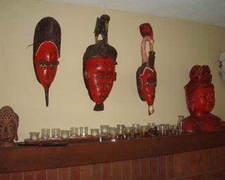 Some of the many Oriental hand carved masks. 