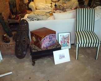 Hand carved masks on the left, Victorian stool, limited ed. prints, large jack in the box and upholstered side chair.
