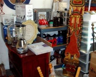 Garage including hand carved Malaysian hand carved and painted figure, antique chest of drawers and other items.