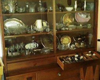 Vintage Stanley china hutch with barware, glassware and metalware.