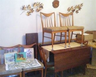 Vintage MCM Stanley Danish-style dining table with six chairs.