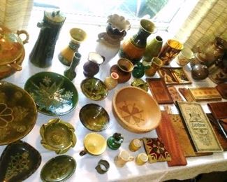 Vintage Latvian glazed pottery and leather crafted goods.