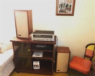 Kenwood receiver, KLH speakers and orange vinyl footstools. 