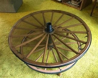 Vintage wagon wheel coffee table.