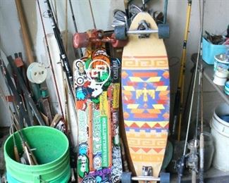 Vintage skateboards and fishing tackle.