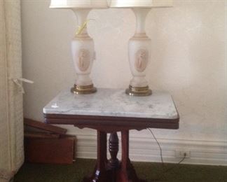 marble top table with pair of vintage lamps