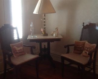 Marble top table, cane back chairs