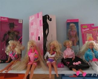 Some new in package Barbie dolls and accessories and some that have been played with - what kid can resist ?