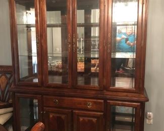 China cabinet with matching sideboard and large table with 8 chairs