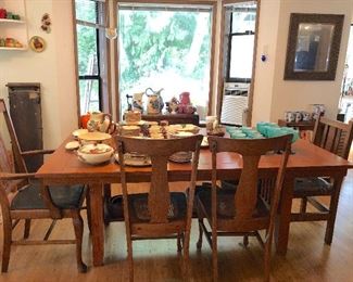 Vintage table with multiple chairs.  Franciscan ware, teal glassware
