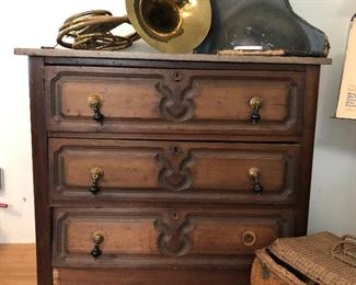 Antique dresser--missing hardware is in the drawer.