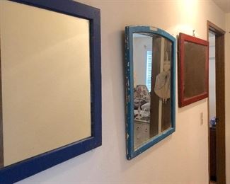 Heavy mirrors framed in wood