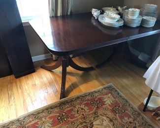Dining room table.  Beautiful, mahogany, double pedestal dining table.  Base table measures 5 feet in length + three separate leafs, each measuring 1 foot.