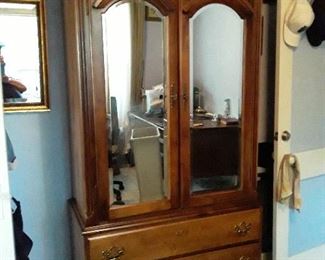 Armoire, 3 drawers in bottom of top section. Solid wood; all drawers dove tailed  with wooden movement/ slide construction.