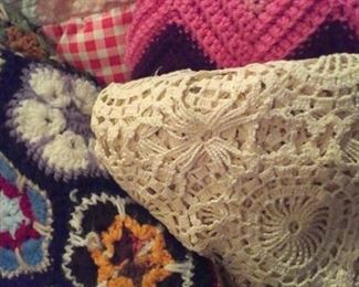 Selection of quilts, crocheted throws & crocheted tablecloth/bed cover