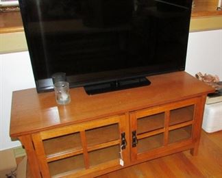 Flat screen television and nice cabinet/stand