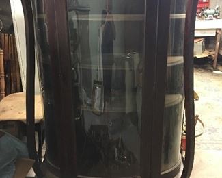 Lovely turn of century curved glass china cabinet