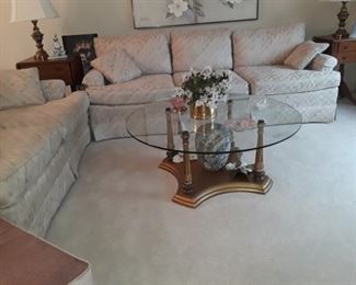 Hollywood Regency coffee table and end table. Very nice pastel sofas. 