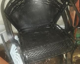 4 wrought iron chairs, matching set with table. 