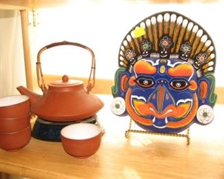 Pottery tea set, ceremonial mask