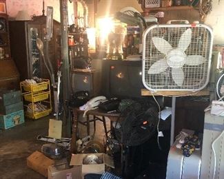 fans, small wooden table, bicycle wheels