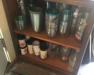 Tervis tumblers, wooden bookcase
