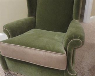 Green Mohar Swivel Rocker
with Leather Piping and Fringe Trim