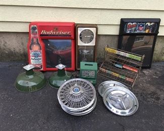 Beer signs, time clock, hub caps, and gum display