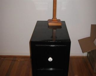 one of a pair of end tables/nightstands painted different colors