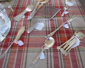 Assorted sterling pieces-fish forks, cake cutter, salad servers, master butter