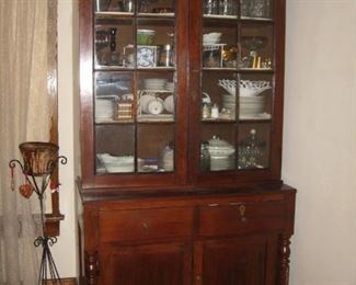 Antique step back mahogany cabinet