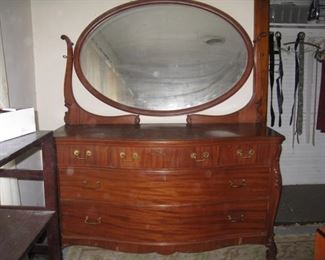 Serpentine front dresser