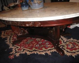 another marble top table-oval top